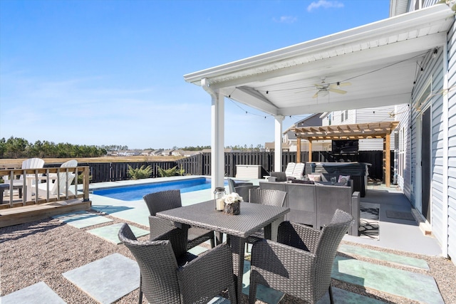 view of patio / terrace featuring a fenced in pool, a hot tub, ceiling fan, outdoor dining area, and a fenced backyard