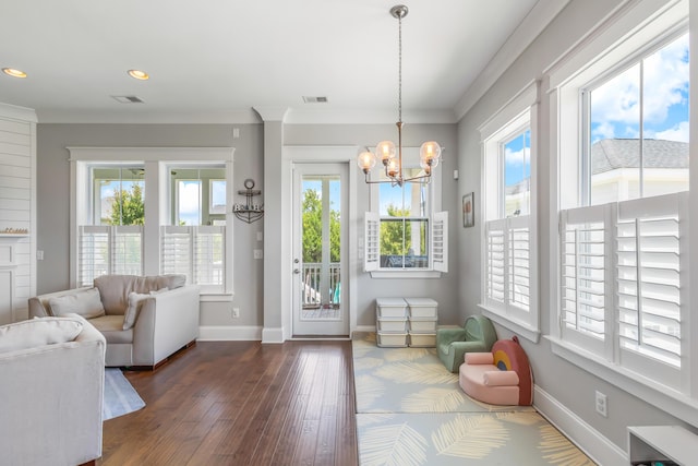 1722 Trewin Ct, Charleston, SC 29492 - living room with dark wood-type flooring, a chandelier, recessed lighting, and crown molding
