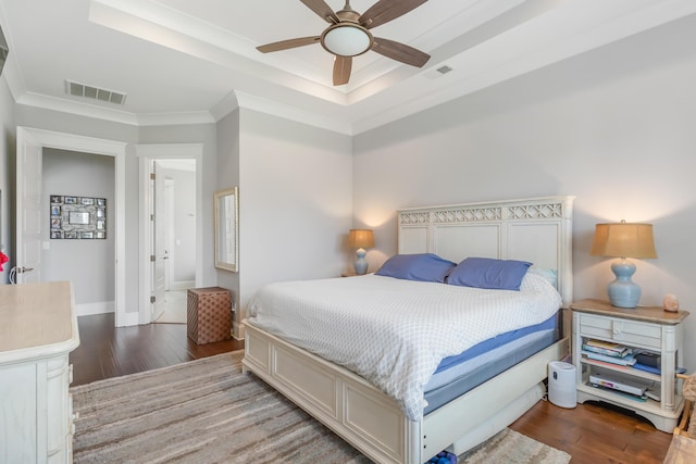 1722 Trewin Ct, Charleston, SC 29492 - bedroom with wood finished floors, a tray ceiling, crown molding, and a ceiling fan