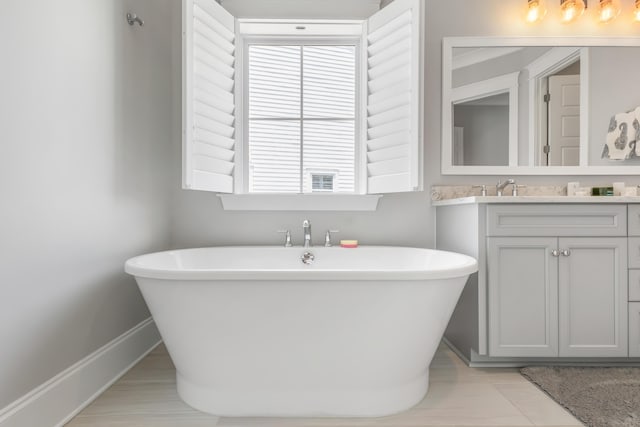 1722 Trewin Ct, Charleston, SC 29492 - bathroom with vanity and a soaking tub