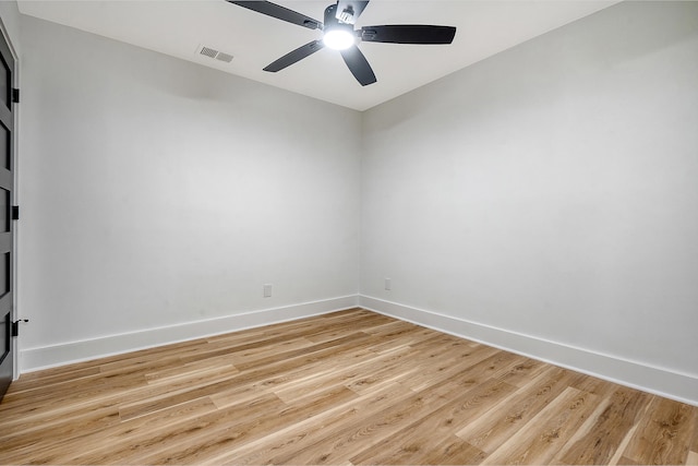 spare room featuring ceiling fan and light wood-type flooring