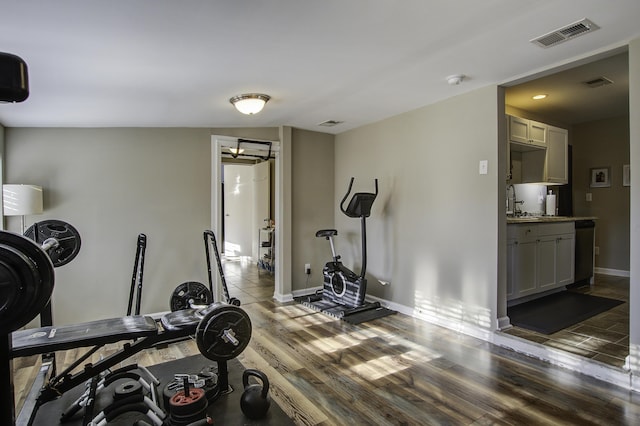 exercise room featuring dark hardwood / wood-style flooring