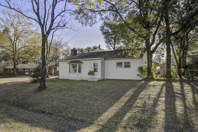 view of front of home with a front yard