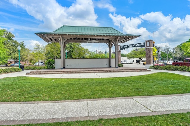 surrounding community featuring a gazebo and a yard