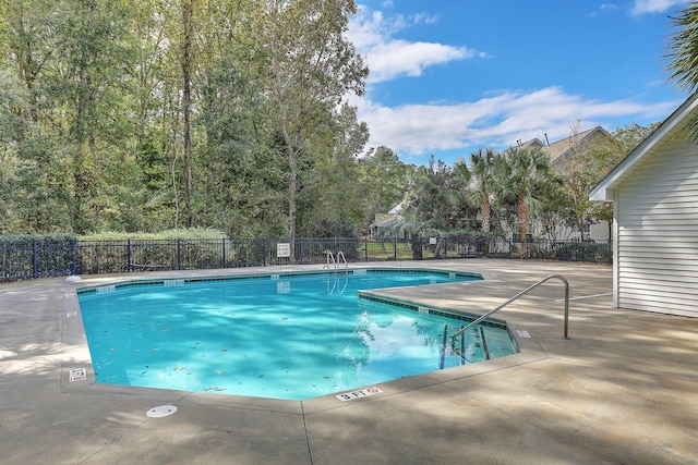 view of pool featuring a patio area