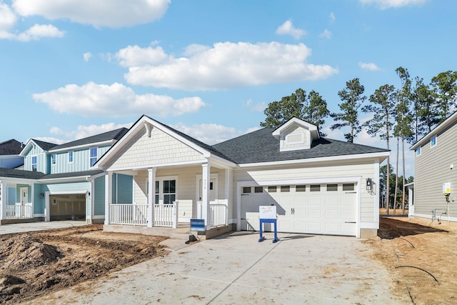 316 Calm Water Way, Summerville, SC 29486 - view of front facade with covered porch, concrete driveway, and an attached garage
