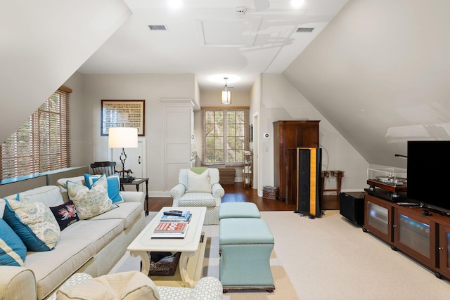 living room with lofted ceiling