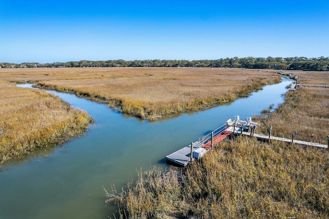 bird's eye view featuring a water view and a rural view