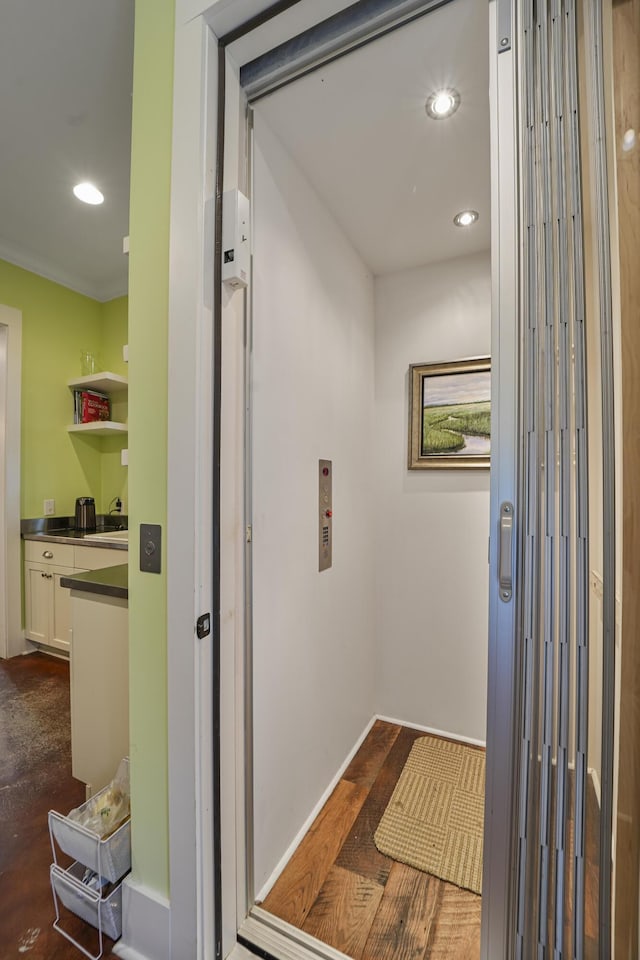 1193 River Rd, Johns Island, SC 29455 - corridor with elevator, recessed lighting, and ornamental molding