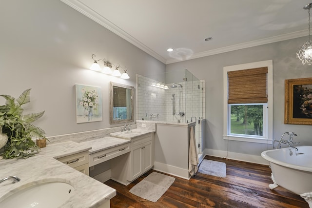 1193 River Rd, Johns Island, SC 29455 - full bathroom with vanity, tiled shower, crown molding, a soaking tub, and wood finished floors