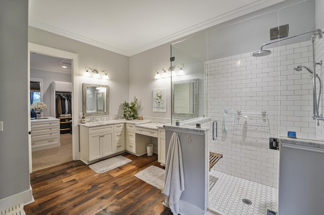 1193 River Rd, Johns Island, SC 29455 - full bath with crown molding, a stall shower, vanity, wood finished floors, and a spacious closet