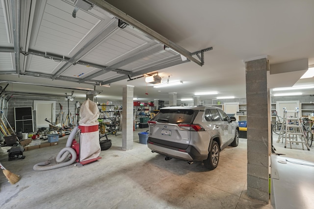 1193 River Rd, Johns Island, SC 29455 - garage featuring a garage door opener