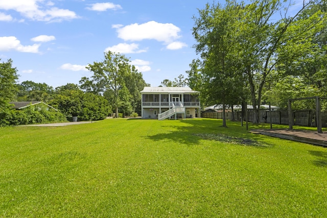 1193 River Rd, Johns Island, SC 29455 - view of yard with a sunroom, stairs, and a wooden deck