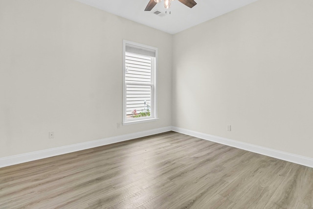 unfurnished room with ceiling fan and light hardwood / wood-style flooring