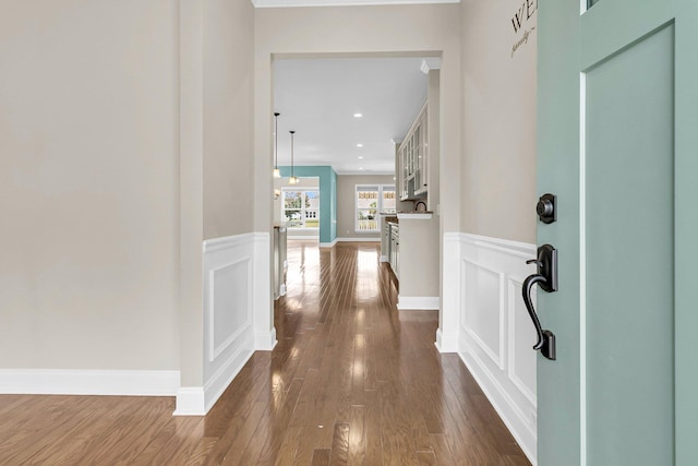 corridor featuring dark wood-type flooring