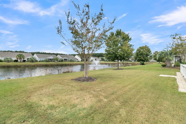 view of yard with a water view