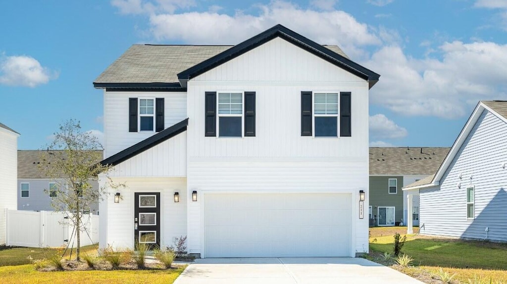 view of front of home with a garage