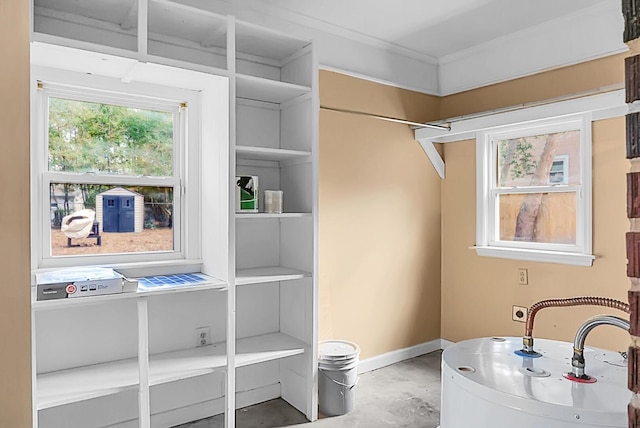 spacious closet featuring water heater