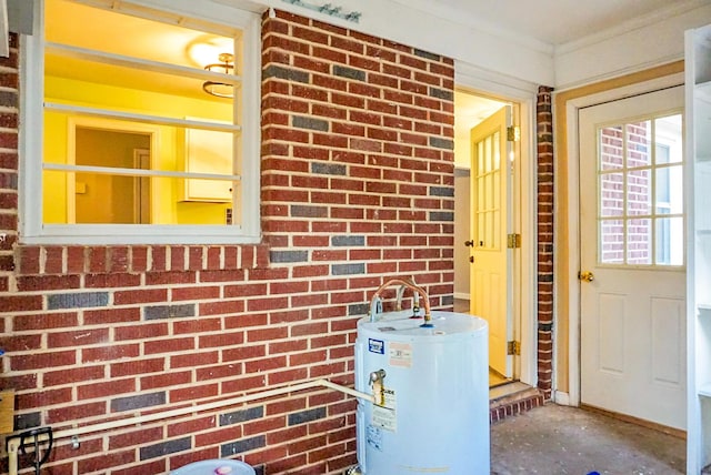 utility room with gas water heater