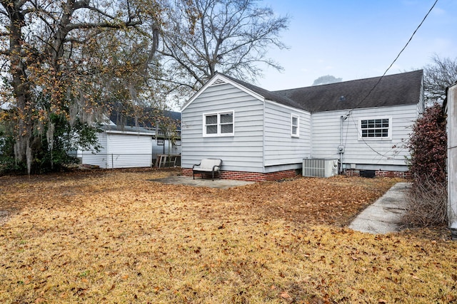 back of property featuring a patio and cooling unit