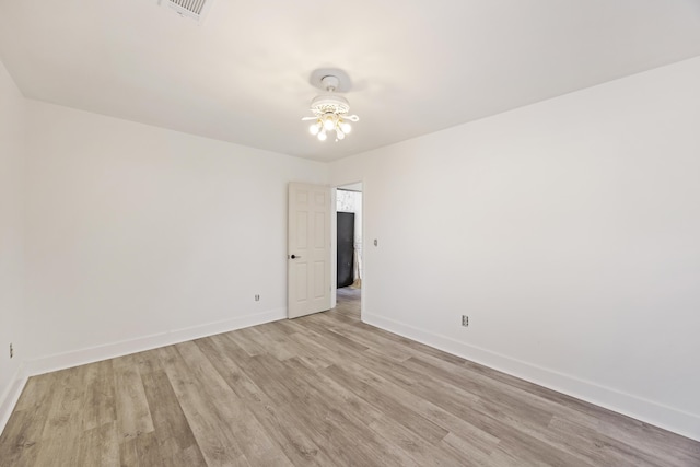 empty room featuring light hardwood / wood-style floors