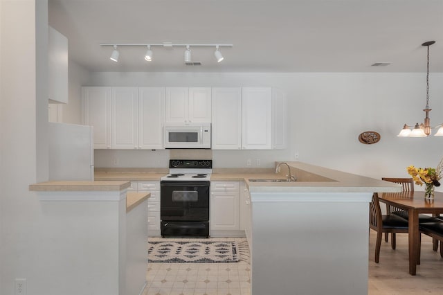 kitchen featuring kitchen peninsula, hanging light fixtures, white cabinetry, sink, and white appliances