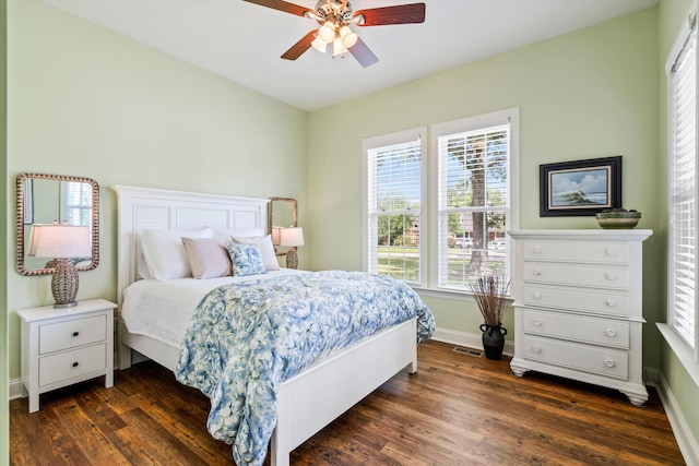 1119 Bruton Blvd, Moncks Corner, SC 29461 - bedroom with baseboards, dark wood-type flooring, and a ceiling fan