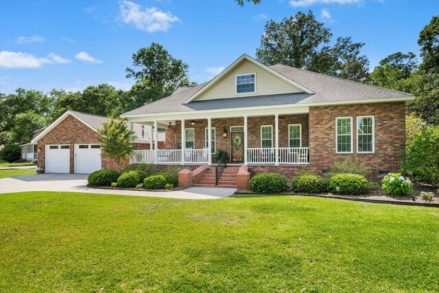 1119 Bruton Blvd, Moncks Corner, SC 29461 - view of front of property with a porch, brick siding, and a front yard