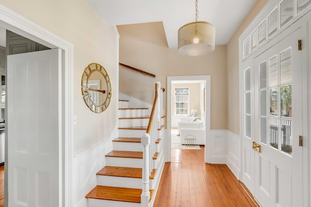 entrance foyer with plenty of natural light and light wood-type flooring