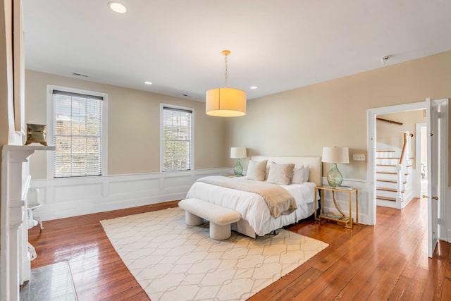 bedroom with hardwood / wood-style flooring