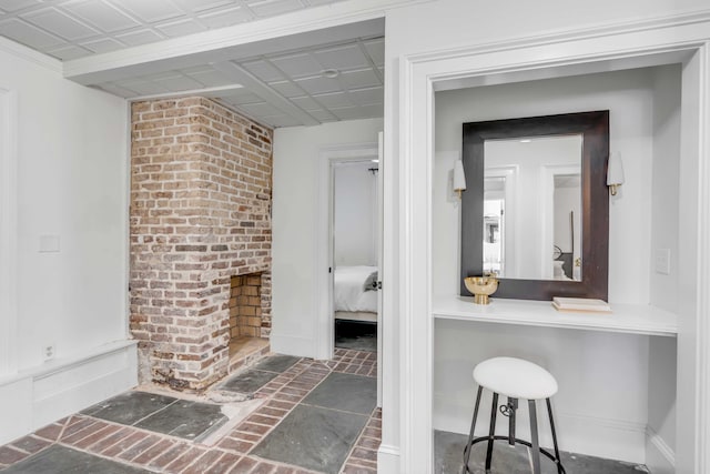 bathroom with a fireplace