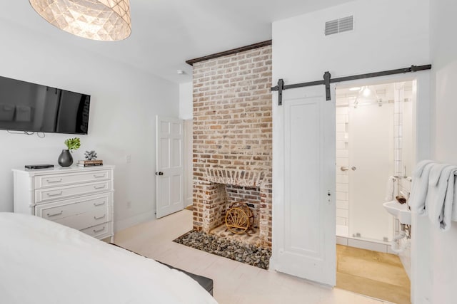 bedroom with a barn door