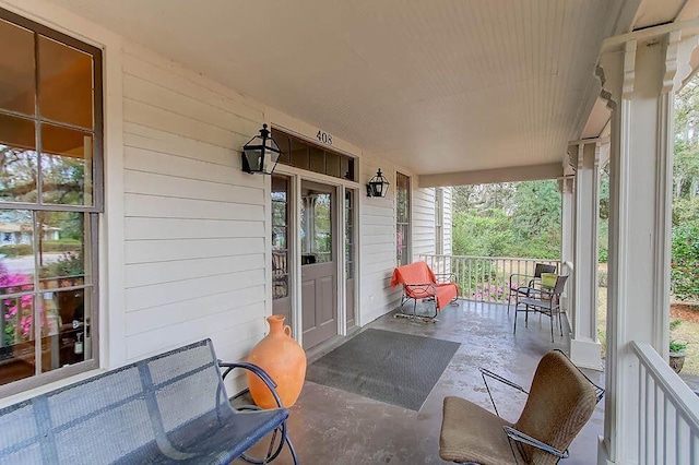 view of patio featuring a porch