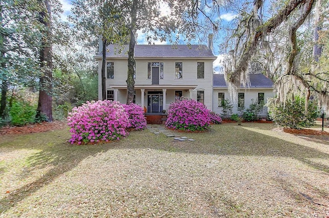 colonial home with covered porch