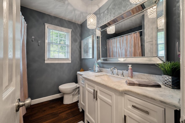 2220 Pinehurst Ave, Charleston, SC 29414 - bathroom with wood-type flooring, baseboards, toilet, vanity, and a shower with curtain
