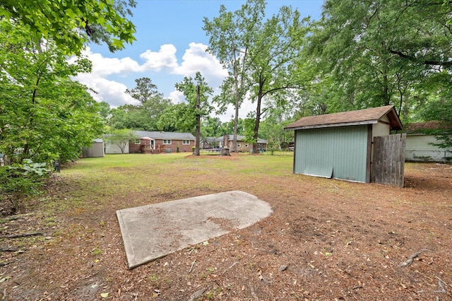 2220 Pinehurst Ave, Charleston, SC 29414 - view of grassy yard featuring a storage shed and an outbuilding