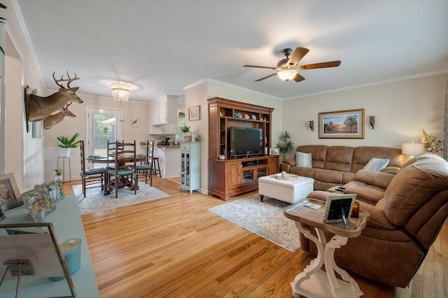 2220 Pinehurst Ave, Charleston, SC 29414 - living room featuring light wood-style floors, ceiling fan, and crown molding
