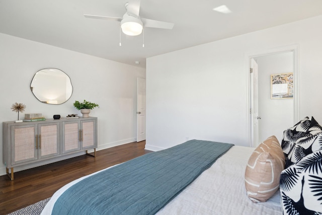 bedroom with dark wood-type flooring and ceiling fan