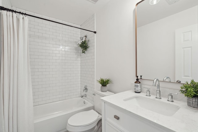 full bathroom with vanity, toilet, and shower / bath combo with shower curtain