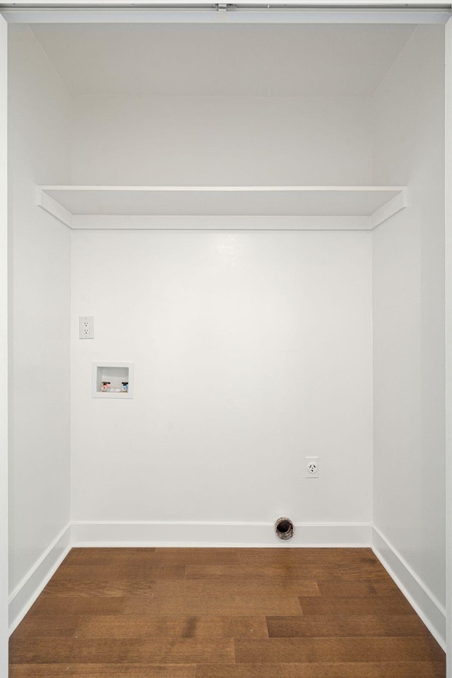 laundry area featuring hookup for a washing machine, electric dryer hookup, and dark hardwood / wood-style floors