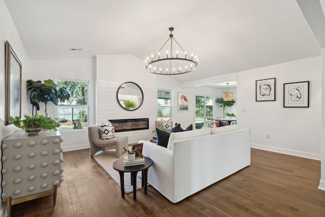 living room with lofted ceiling, a fireplace, and dark hardwood / wood-style flooring