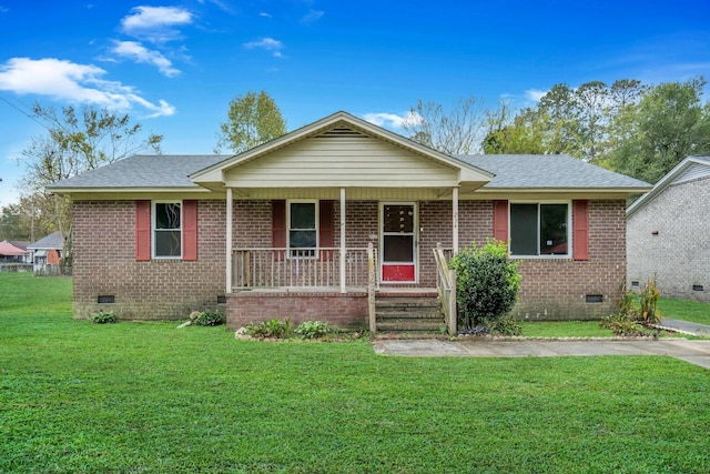 view of front of property featuring covered porch and a front yard