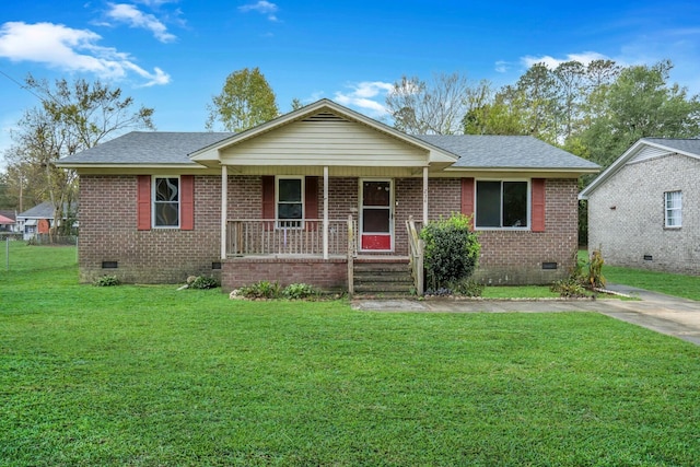 view of front of property with covered porch and a front lawn