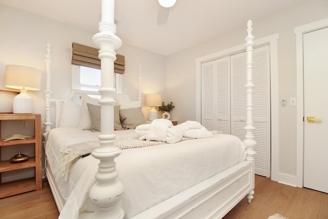 bedroom featuring a ceiling fan and wood finished floors