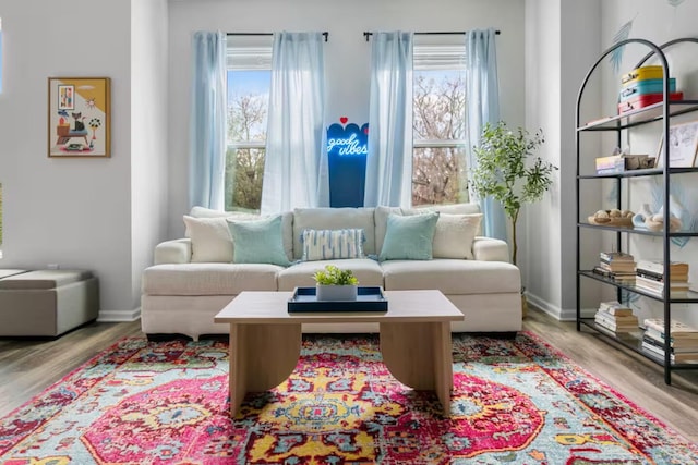 sitting room featuring wood finished floors and baseboards