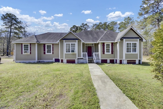 ranch-style home featuring a front yard