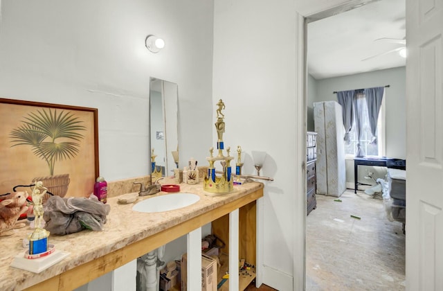 bathroom featuring ceiling fan and vanity