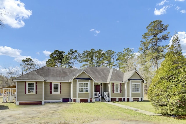 ranch-style house featuring a front lawn