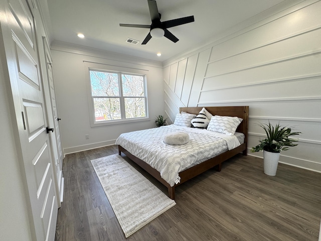 bedroom featuring baseboards, visible vents, recessed lighting, dark wood-style flooring, and crown molding