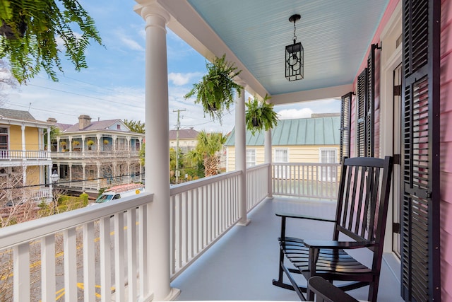 balcony featuring a porch